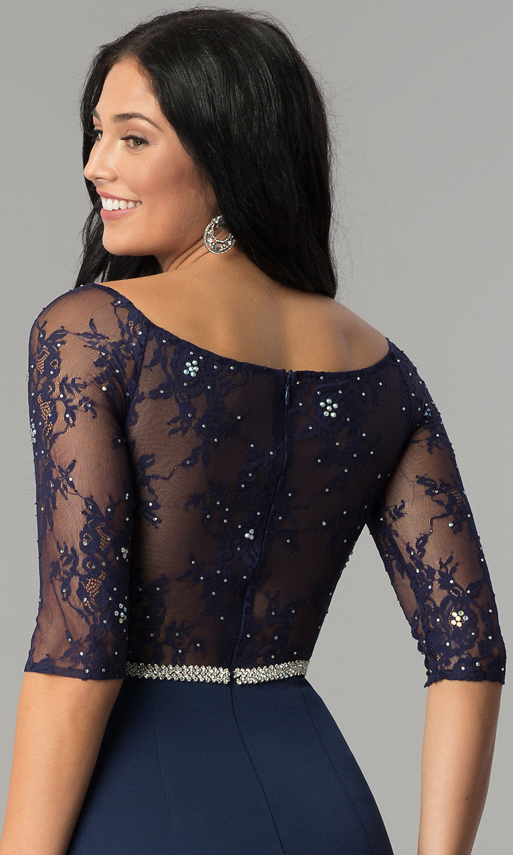 Woman wearing a Three-Quarter-Sleeve Lace-Bodice Long Prom Dress in navy blue, featuring sheer sequined lace, jeweled waistband, and elegant half sleeves.